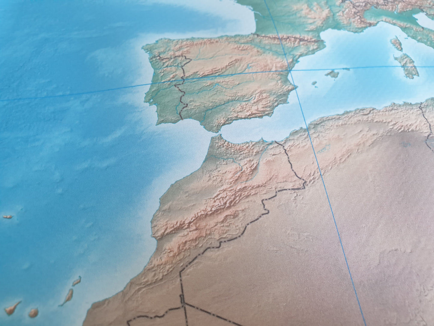 large world map used for floor learning in class